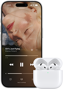 iPhone next to AirPods in charging case, case is open