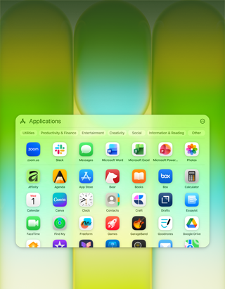 MacBook Neo screen with Applications window containing Microsoft PowerPoint, Word, Excel and OneNote, Google Chrome and Google Drive, FaceTime, Messages, Photos, Notes, Canva, WhatsApp, Zoom, Essayist, Craft, Affinity, Box and Todoist