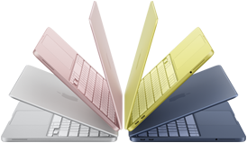 MacBook Neo laptops in silver, blush, citrus and indigo colours, slightly open and arranged in an arch formation
