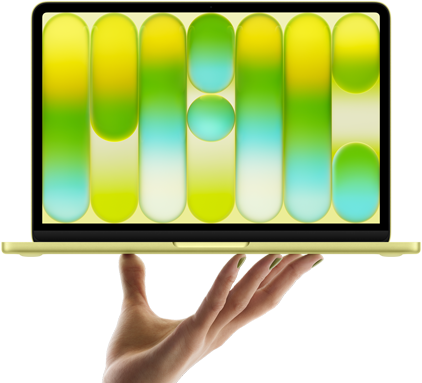 MacBook Neo in citrus colour, balanced on fingertips of open hand, screen displaying colourful abstract pattern