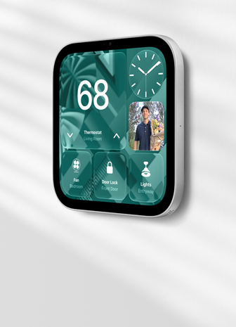 Apple HomeView wall-mounted model on a wall, silver color, displaying time, temperature, and controls for thermostat, bedroom fan, door lock, and lights