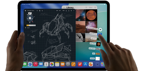 iPad Pro, space black colour, left hand holding device, right hand pointing gesturing to manipulate multiple open app windows, a drawing app with sketches of mechanical designs, photos library of planets and space images, downloads folder files fanned out