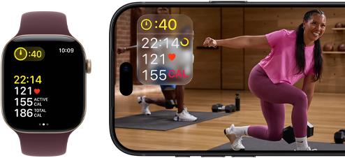 Apple Watch next to iPhone with Apple Fitness+ class on screen
