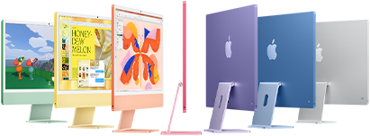 Seven iMac models in colors green, yellow, orange, pink, purple, blue, and silver, in an accordion arrangement