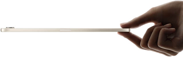 iPad mini, held in hand, side view, thin and lightweight design