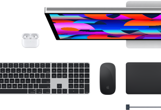 Mac accessories: AirPods, Studio Display, Magic Keyboard, Magic Mouse, Magic Trackpad, MagSafe charge cable in Midnight colour